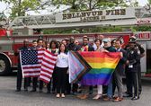City representatives stand behind U.S. and Pride flags