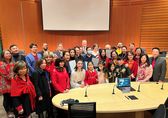 Community members celebrate a proclamation concerning the Lunar New Year.