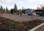 The city-owned parking lot for the safe parking pilot is next to a building where showers and case management will be available. 