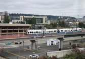 Light rail trains run along the East Link tracks as part of Sound Transit's testing.