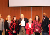 Duwamish Tribal Council Chairwoman Cecile Hansen, fifth from left, accepts the proclamation. Desiree Fagan (third from left) and Cindy Williams (third from right), are also on the Duwamish Council.